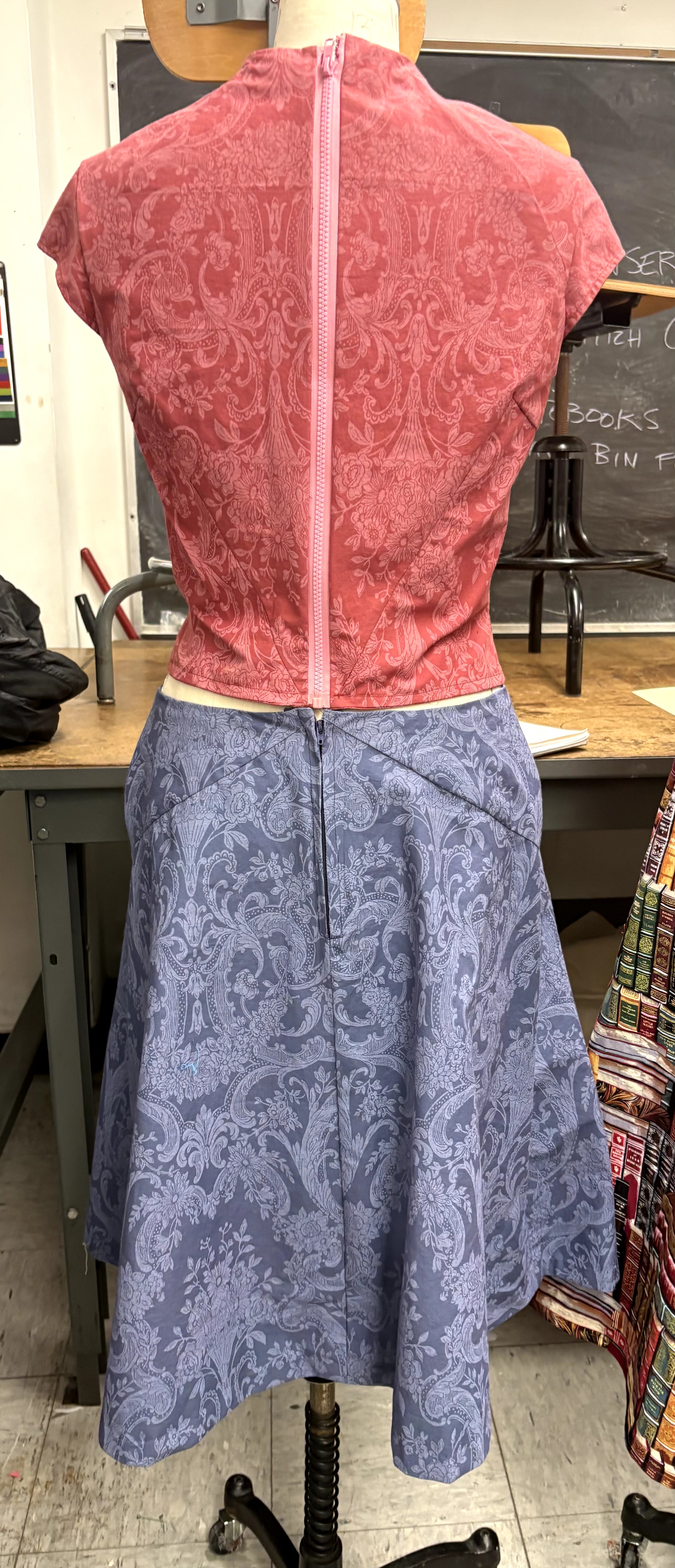 Red paisley top and navy skirt, back